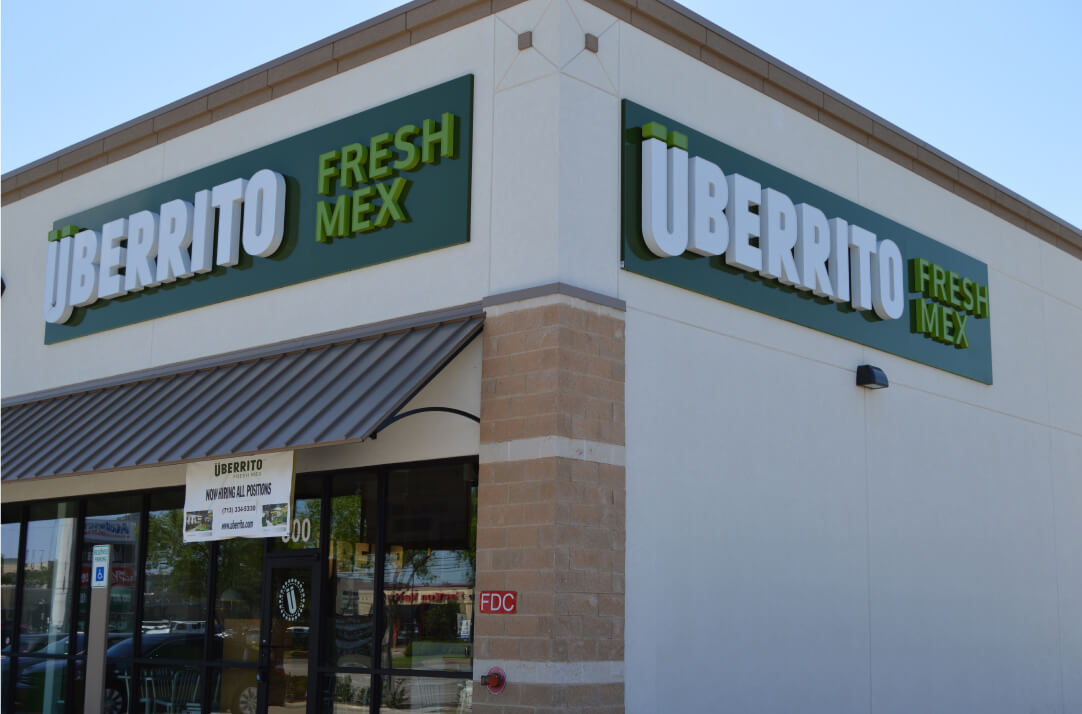 A store with a sign that says uberto.