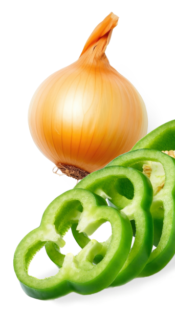 Onion and peppers on a black background at a Mexican restaurant franchise.